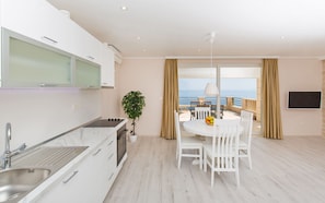 Apartment, 1 Bedroom, Terrace, Sea View | Private kitchen | Fridge, oven, stovetop, coffee/tea maker