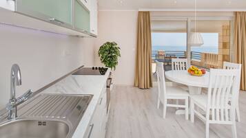 Apartment, 1 Bedroom, Terrace, Sea View | Private kitchen | Fridge, oven, stovetop, coffee/tea maker