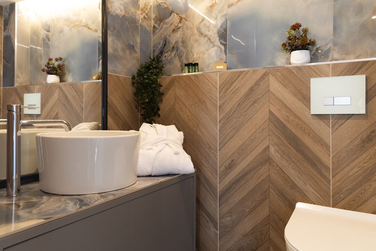 mythic blue suite with pool & mountain view | bathroom | shower, free toiletries, hair dryer, towels