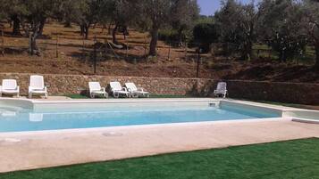 Seasonal outdoor pool, pool umbrellas, pool loungers