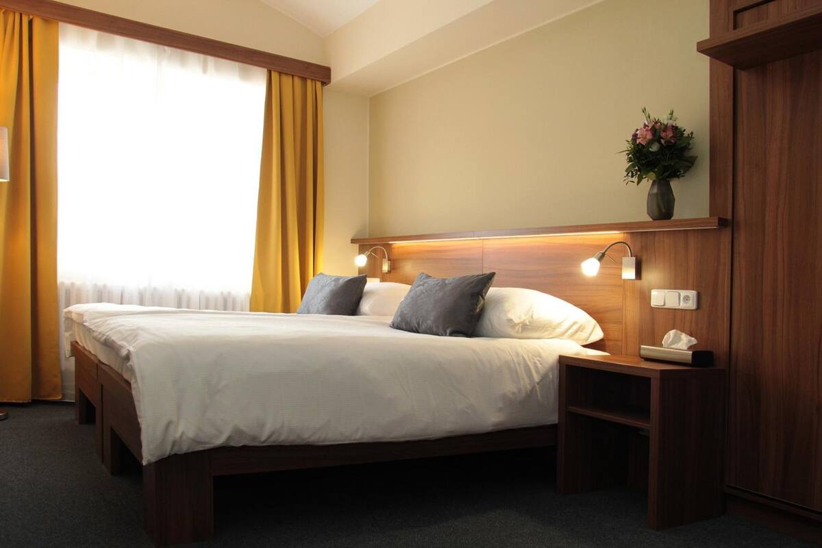 desk, blackout curtains, soundproofing, iron/ironing board