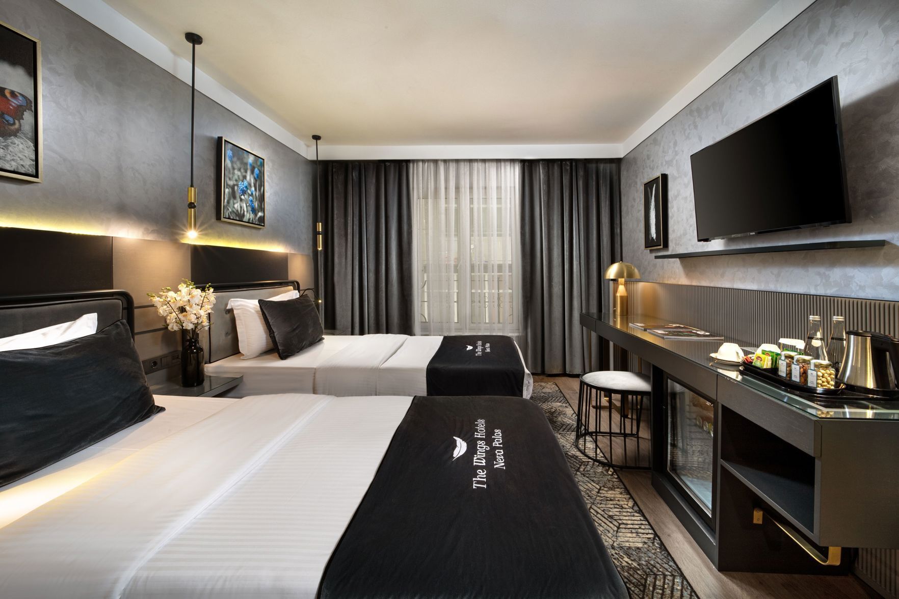 Ropa de cama de alta calidad, camas con efecto memoria y minibar 