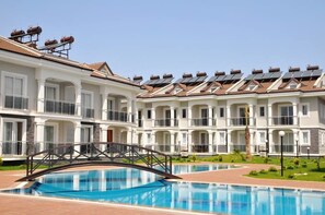 Outdoor pool, pool umbrellas, pool loungers