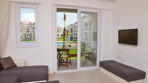 Apartment, 2 Bedrooms | Living room | LCD TV
