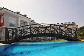 Outdoor pool, pool umbrellas, pool loungers