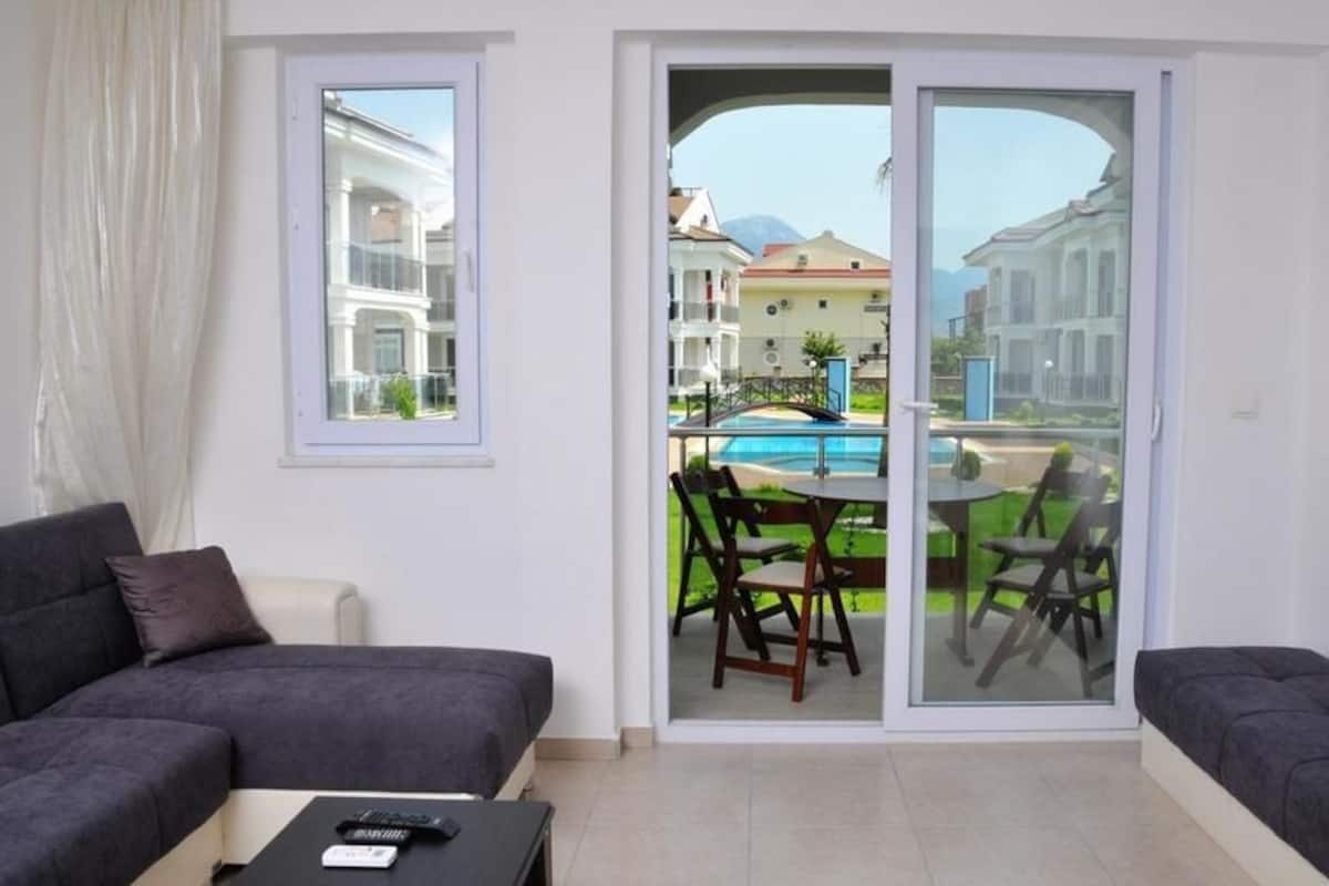 Apartment, 1 Bedroom | Living room | LCD TV