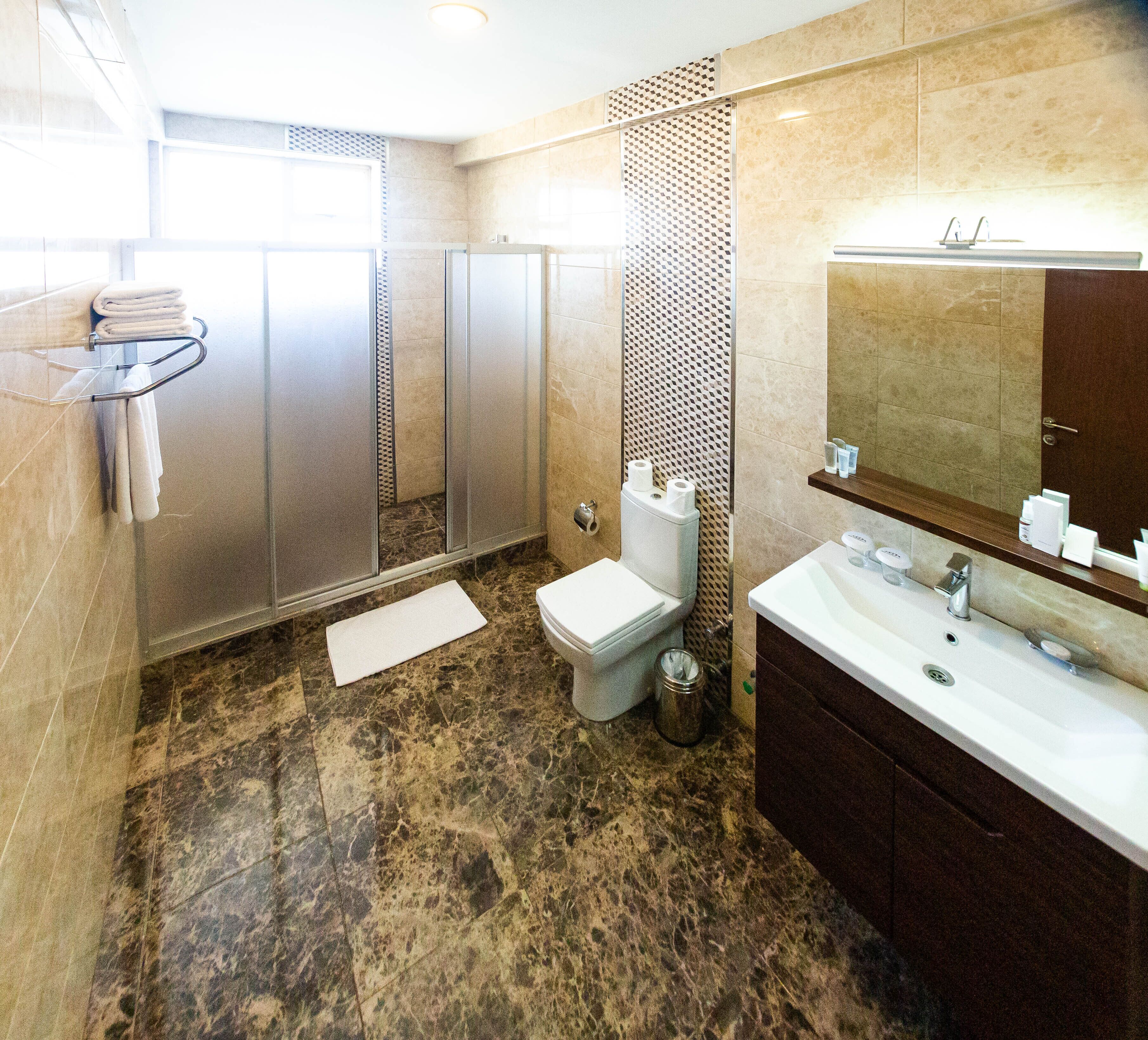 shower, free toiletries, towels, soap