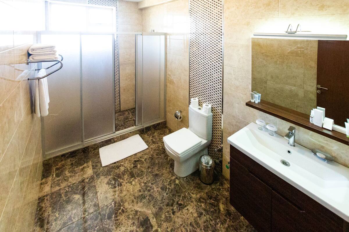 shower, free toiletries, towels, soap