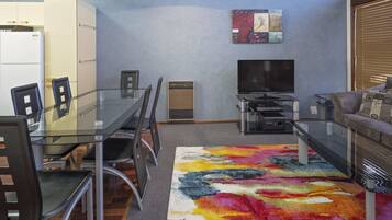 Apartment, 3 Bedrooms | Living area | Flat-screen TV, DVD player