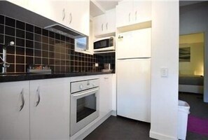 Cabin, 1 Bedroom | Private kitchen | Fridge, cookware/dishes/utensils - Riverside Cabins - 1 bedroom + Loft (Thredbo)
