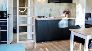 Småhus – elite, 1 queensize-seng, elveutsikt | Eget kjøkken