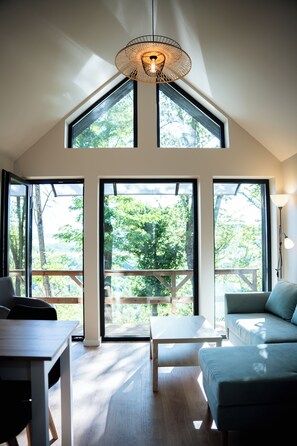 Elite Cottage, 1 Queen Bed, River View | Living area | Flat-screen TV - Chateau La Grange fort (Les Pradeaux)