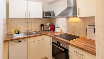Comfort Condo, 1 King Bed (5) | Private kitchen | Full-size fridge, microwave, oven, stovetop