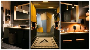 A modern kitchen with a central island, a sink, and a trash bin. - Urban Loft & Spa Marseille (Marseille)