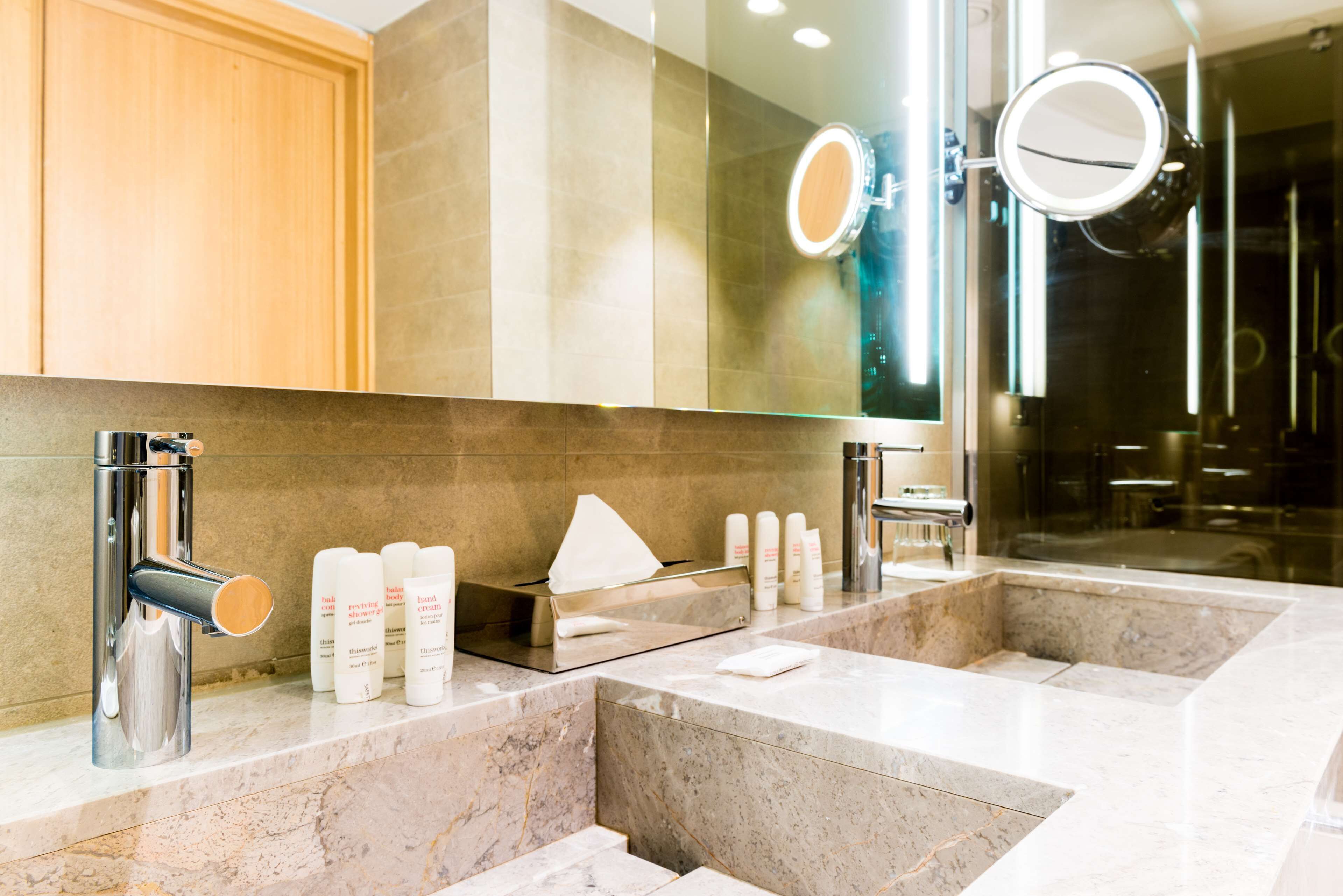 combined shower/bathtub, free toiletries, hair dryer, slippers