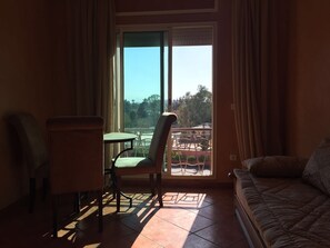 Apartment | Living area | 32-inch LED TV with cable channels, TV - Cocooning Appartement - Adults Only (Marrakech)