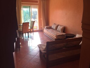 Apartment | Living area | 32-inch LED TV with cable channels, TV - Cocooning Appartement - Adults Only (Marrakech)