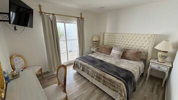 Fer et planche à repasser, draps fournis