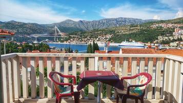 Apartamento conforto, vista para o porto | Sacada