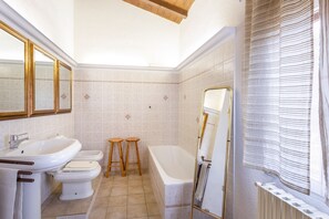 Bathtub, hair dryer, bidet
