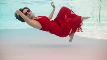 Outdoor pool, open 10:00 AM to 7:00 PM, pool umbrellas, sun loungers