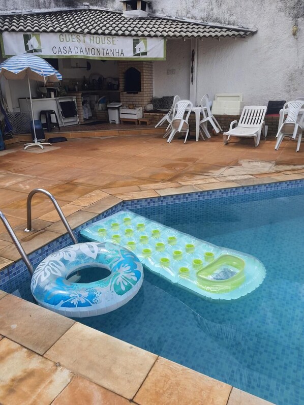 Outdoor pool, pool umbrellas, pool loungers