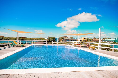 Waterfront Condo with Sea View, Shared Pool, WiFi, & Central AC - Near Beaches