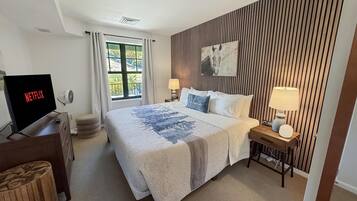 1 bedroom, desk, iron/ironing board, travel crib