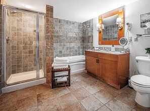 Bathtub, hair dryer, towels, soap