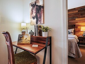 1 bedroom, desk, iron/ironing board, travel crib