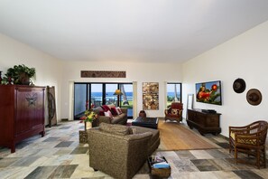 Flat-screen TV, DVD player, books