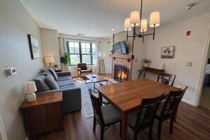 Smart TV, fireplace, foosball