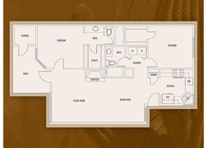 Un plan d’étage comprenant un salon, un coin repas, une cuisine, deux chambres, une salle de bain, un placard, une cheminée et un espace de rangement.