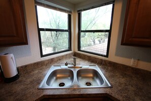 Fridge, microwave, oven, stovetop - Tucson flair in this 2nd floor-serene patio -close to main pool- exercise rm (Tucson)