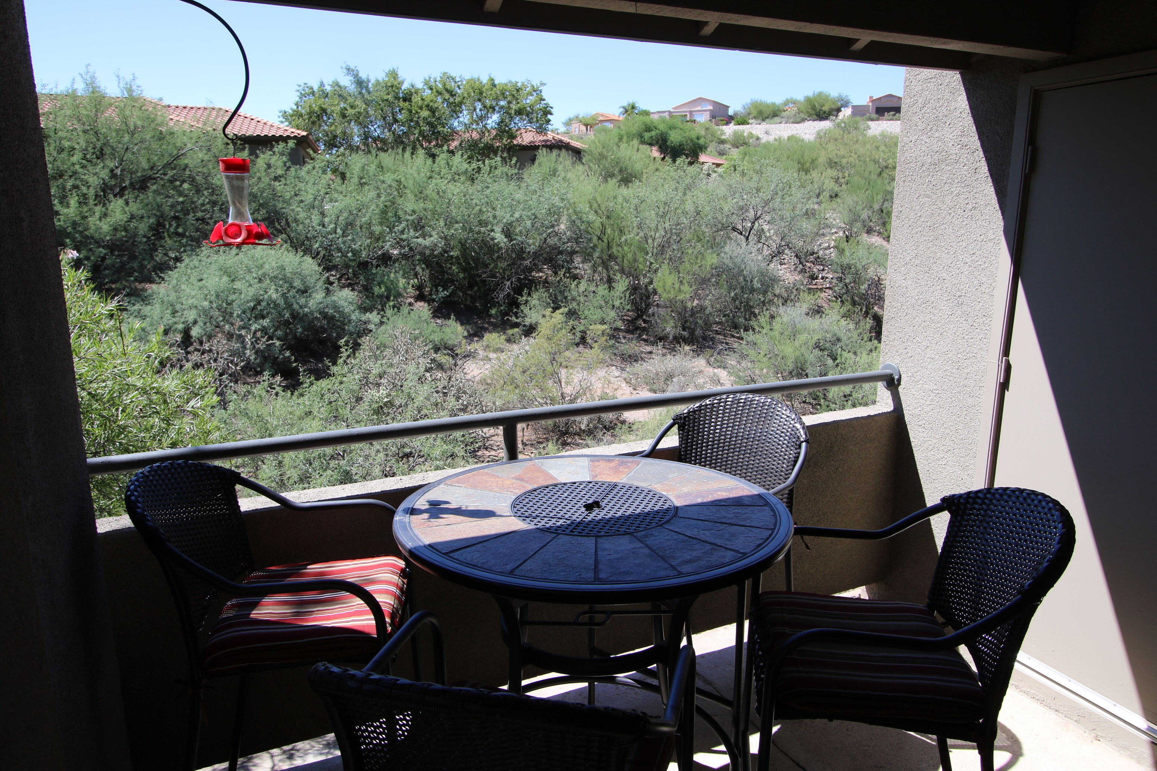 Tucson flair in this 2nd floor-serene patio -close to main pool- exercise rm