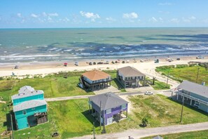 Enjoy a serene coastal retreat with ocean views and access to a sandy beach.