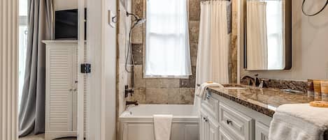 Combined shower/bathtub, hair dryer, towels