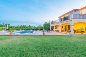 A large house with a swimming pool, outdoor seating, and a well-maintained lawn. - CAN BIELET - Villa with private swimming pool in BINISSALEM with free WiFi (Binissalem)