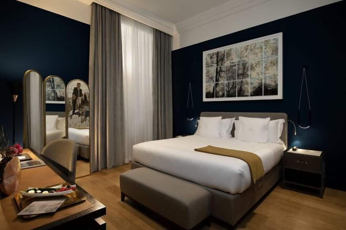 1 kamar tidur, seprai premium, minibar, dan brankas