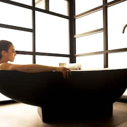 Executive Suite, 1 Bedroom | Bathroom | Rainfall showerhead, free toiletries, hair dryer, bathrobes
