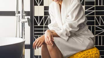 Executive Suite, 1 Bedroom | Bathroom | Rainfall showerhead, free toiletries, hair dryer, bathrobes