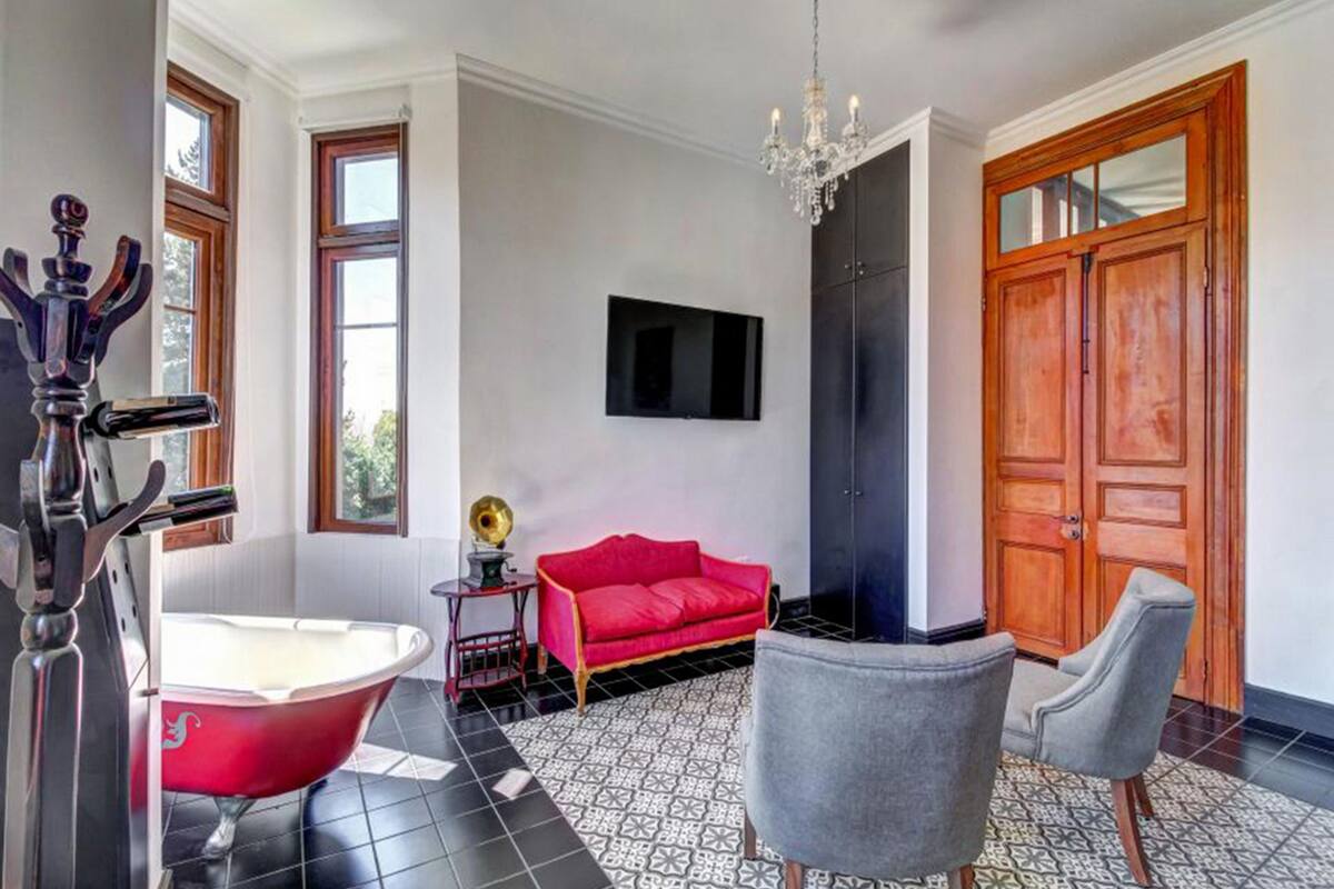 premium suite, 1 king bed, hill view | living area | lcd tv