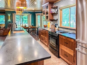 Kitchen with Island and Soapstone Counters