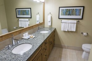 A bathroom with two sinks, a large mirror, and two framed pictures on the wall. - Next to the Red Pine Gondola for Great Winter View by RedAwning - Save 20% on 7+ Nights! (Park City)