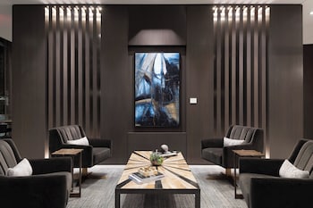 Hotel entrance and lobby at AC Hotel by Marriott Boston Cleveland Circle