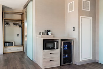 Suite, 1 Bedroom | Premium bedding, in-room safe, desk, iron/ironing board at AC Hotel by Marriott Boston Cleveland Circle