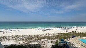 A beach resort with white sand, a pool area, and a view of the ocean. - E805 Great Gulf View, 3 pools, Gym & Tennis Court (Panama City)