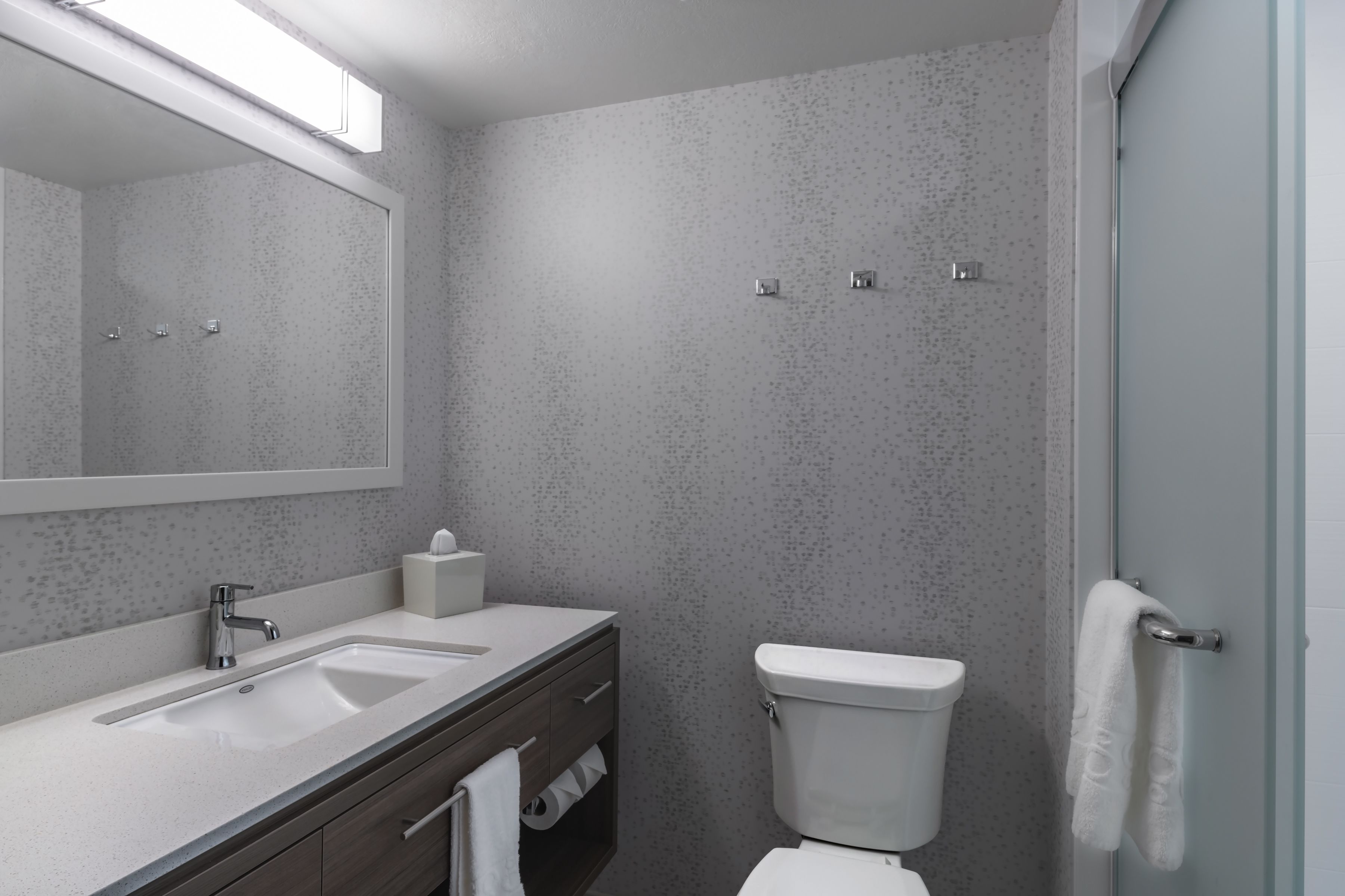 bathtub, free toiletries, hair dryer, towels