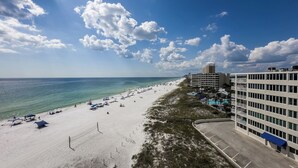 A beach with a hotel and a pool area. - D601 Direct Gulf View, 3 pools, Tennis Court (Panama City)