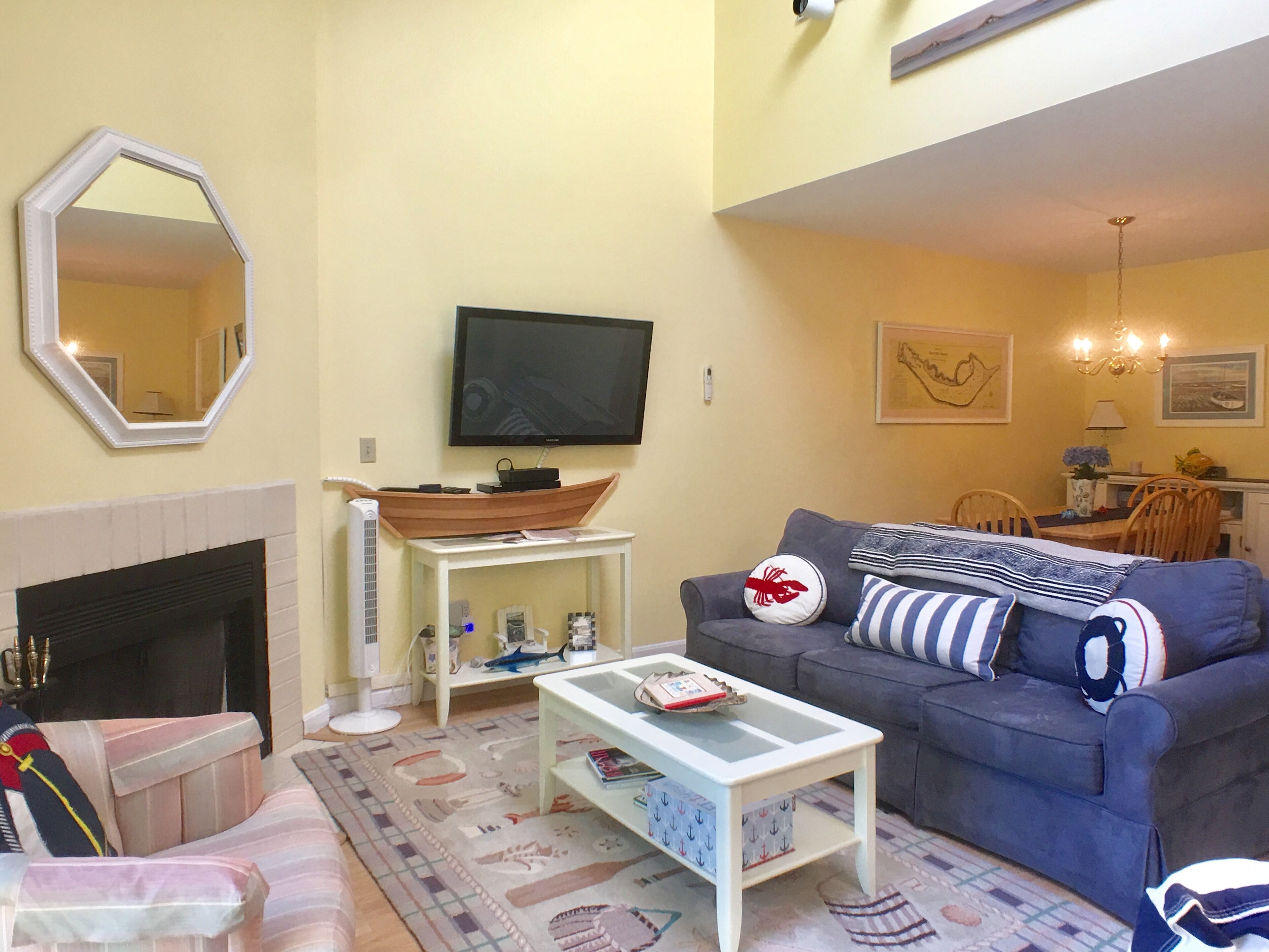 Billington townhouse with straight staircase that leads to an enclosed loft, premium streaming TV.